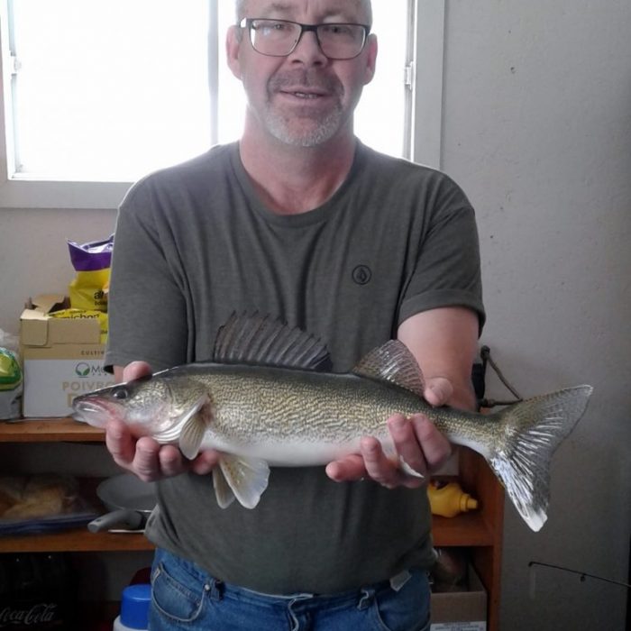 Ice fishing for Walleye in Callander Bay